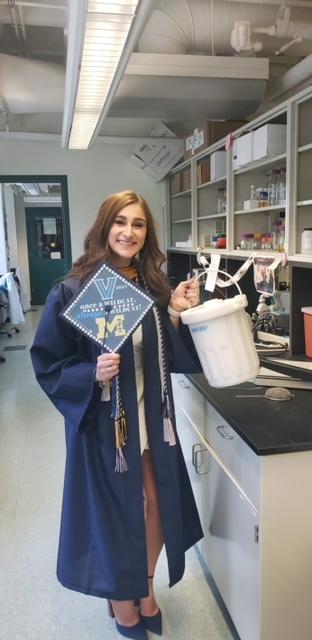 Julianna graduating with her liquid nitrogen dewer